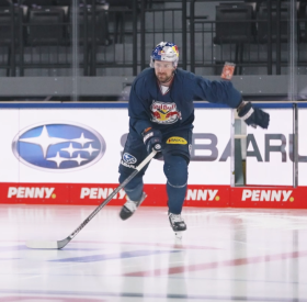 The first player tests the ice on the main playing surface